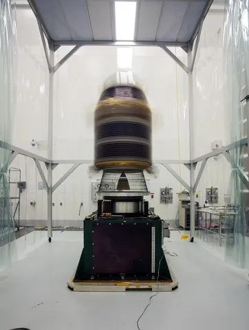 To make sure that the Lunar Atmosphere and Dust Environment (LADEE) spacecraft is perfectly balanced for flight, engineers mount it onto a spin table…
