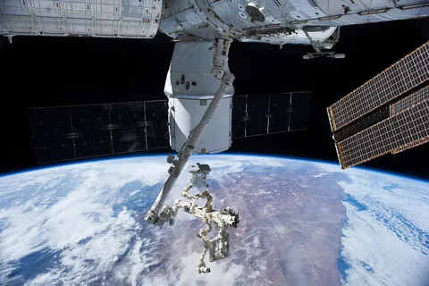 ISS RapidScat nadir adapter removed from CRS 4 Dragon trunk