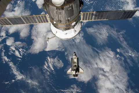 rendezvous and docking with ISS, Progress M63 visible
