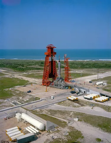 Aerial view of Launch Complex 14 with Missile Row visible to the right. Mercury-Atlas 9 (MA-9), visible on Pad 14, is scheduled to carry astronaut…