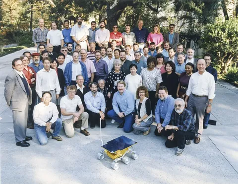 In December 1994, a group of Mars Pathfinder team members gathered for a photo with the Sojourner Rover model. They were working on rover technology…