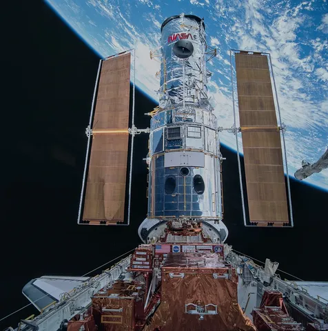 The Hubble Space Telescope in Space Shuttle Discovery's payload bay during STS-82