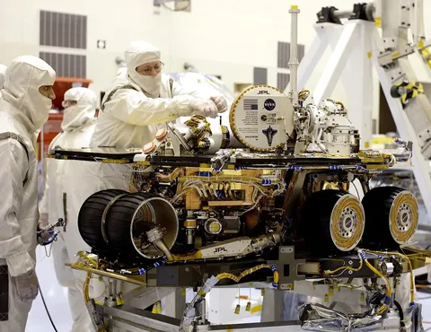 Technicians do final checks on NASA’s Spirit rover in this image from March 28, 2003