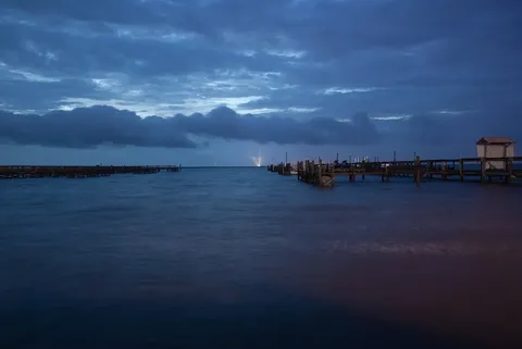 Space Shuttle Atlantis on the launch pad -- from across the Indian River in Titusville.